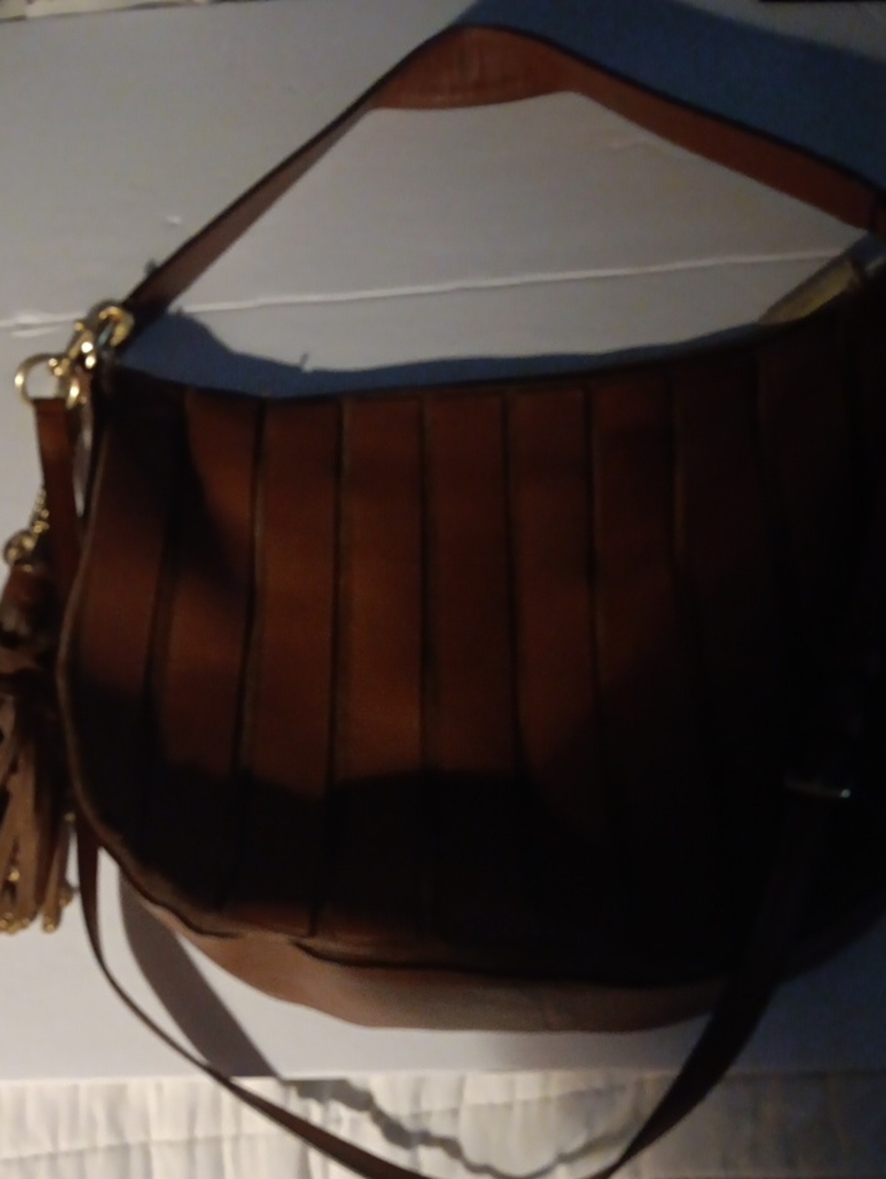 Michael Kors Tan Leather Pleated Hobo with Tassel Worn But Good Condition 08/03